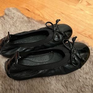 Girl's refined practical ballet flat with a school-appropriate design.